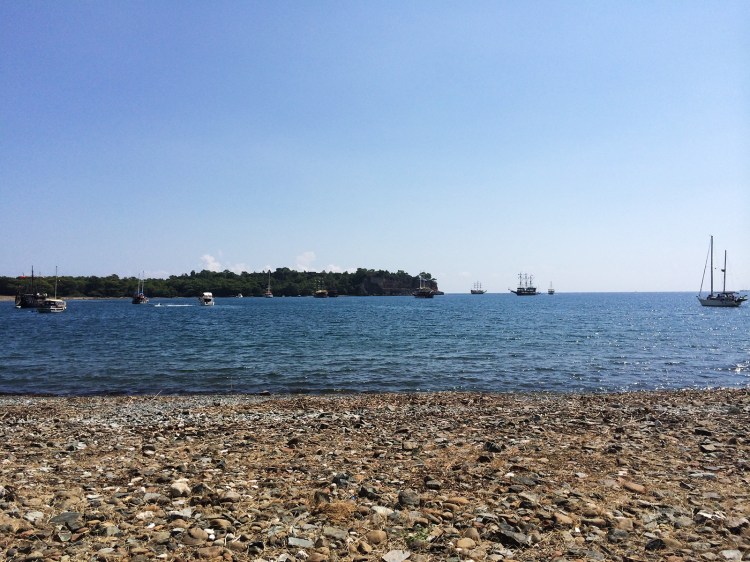 by late morning, a steady stream of day-trip party boats pollute Phaselis' bay with blasting garbage music