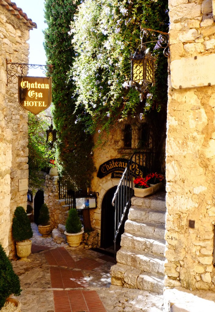 a windy path leads past the posh Château Eza hotel in Eze